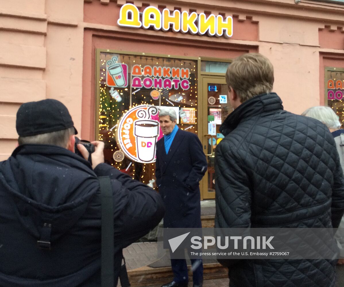 US Secretary of State John Kerry takes a walk on Arbat Street