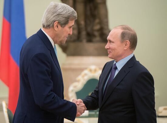 President Vladimir Putin meets with US State Secretary John Kerry