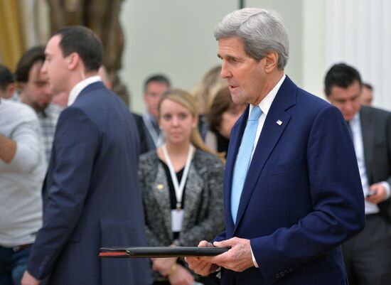 President Vladimir Putin meets with US Secretary of State John Kerry