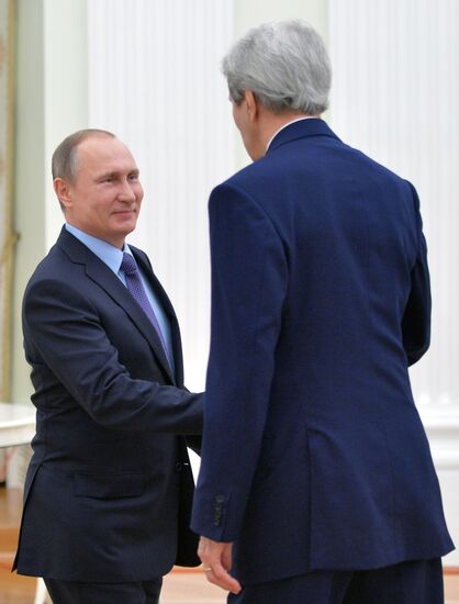 President Vladimir Putin meets with US State Secretary John Kerry