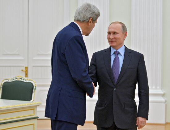 President Vladimir Putin meets with US Secretary of State John Kerry