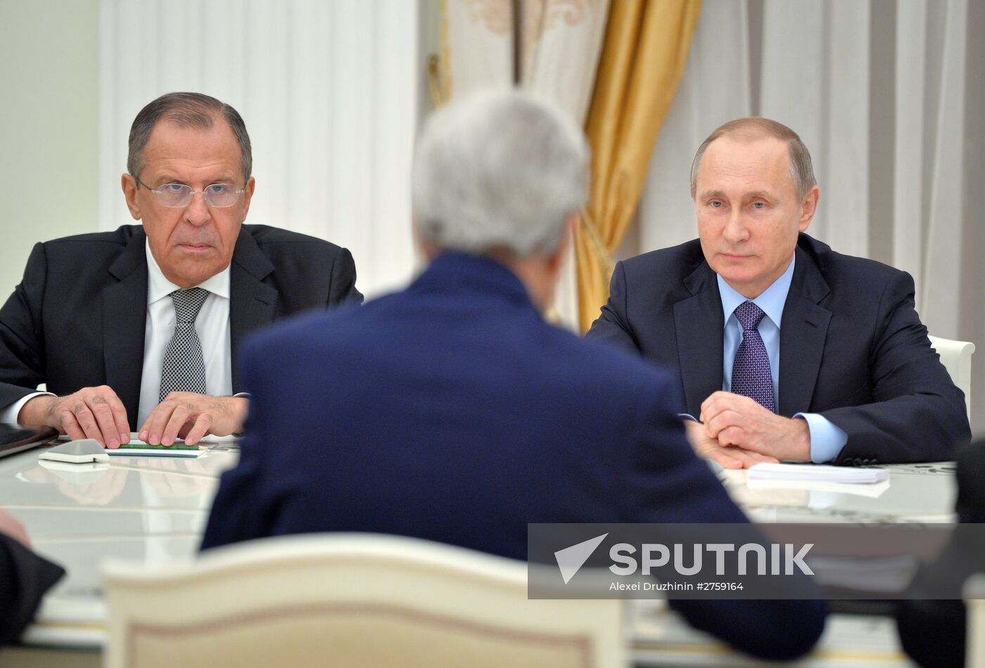 President Vladimir Putin meets with US Secretary of State John Kerry