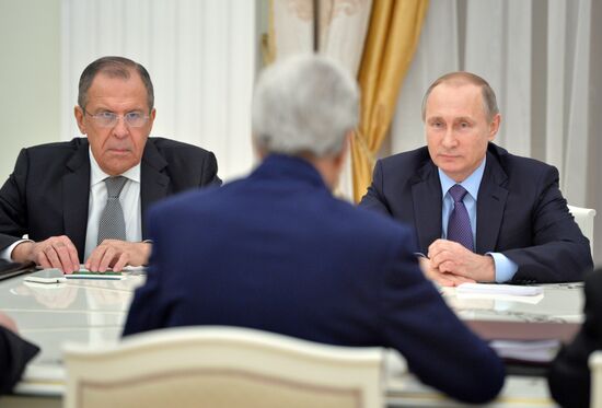 President Vladimir Putin meets with US Secretary of State John Kerry