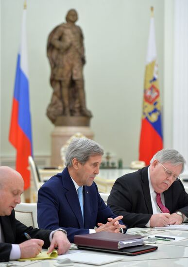 President Vladimir Putin meets with US Secretary of State John Kerry