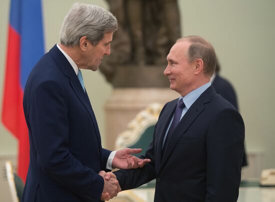 President Vladimir Putin meets with US Secretary of State John Kerry