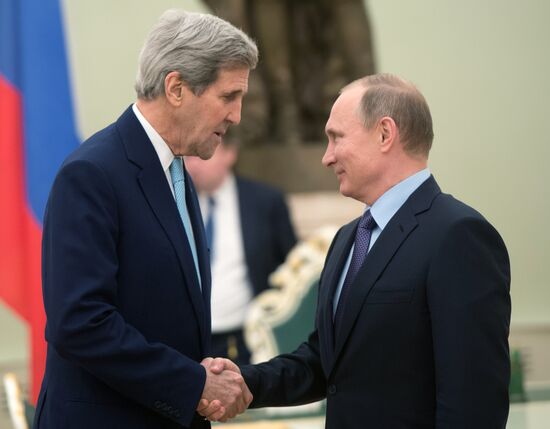 President Vladimir Putin meets with US Secretary of State John Kerry
