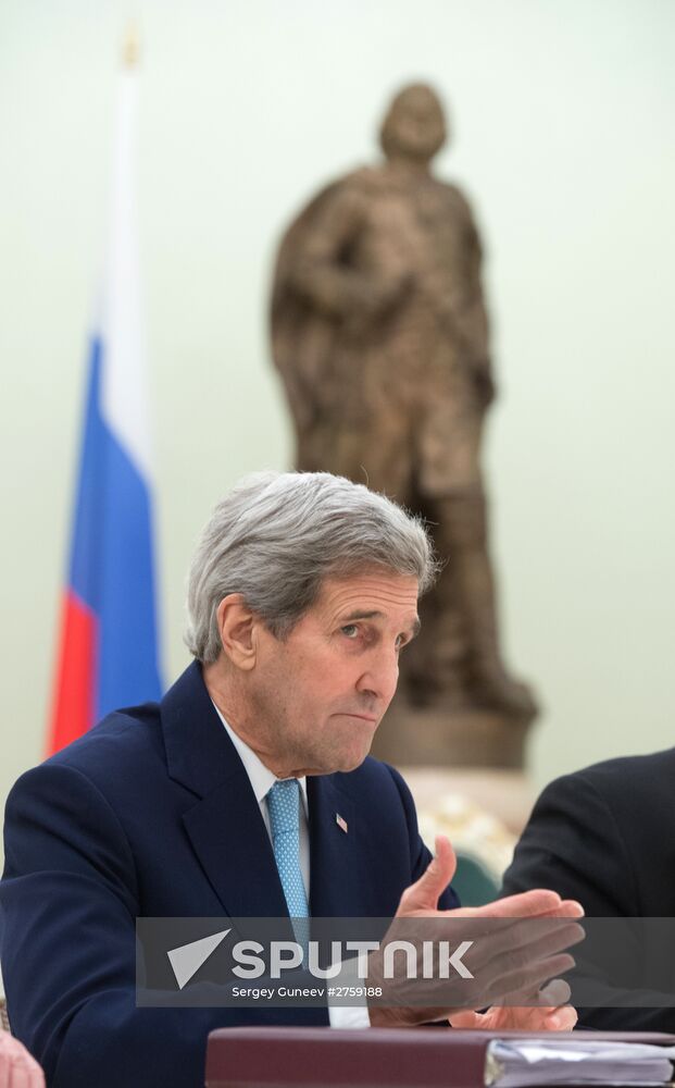 President Vladimir Putin meets with US Secretary of State John Kerry
