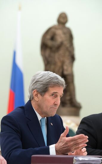 President Vladimir Putin meets with US Secretary of State John Kerry