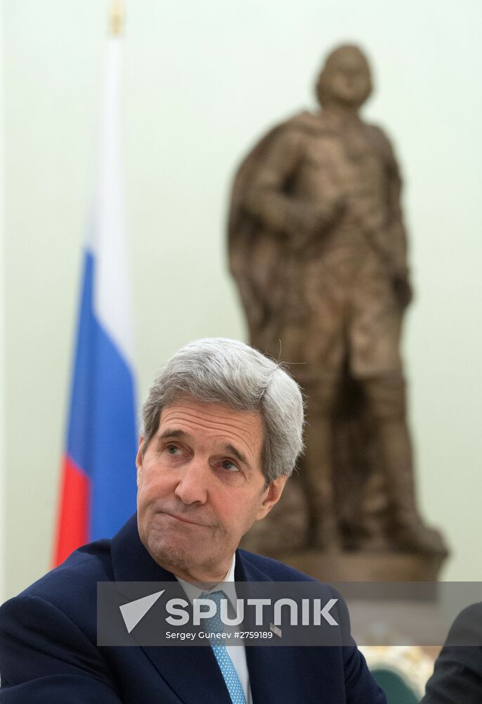 President Vladimir Putin meets with US Secretary of State John Kerry