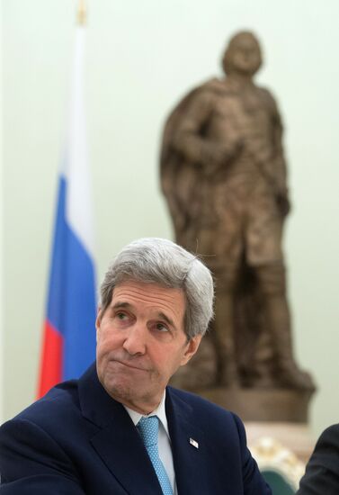 President Vladimir Putin meets with US Secretary of State John Kerry