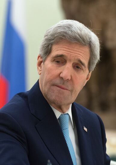 President Vladimir Putin meets with US Secretary of State John Kerry