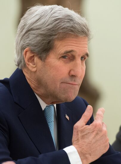 President Vladimir Putin meets with US Secretary of State John Kerry