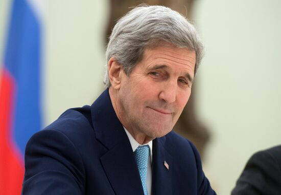President Vladimir Putin meets with US Secretary of State John Kerry
