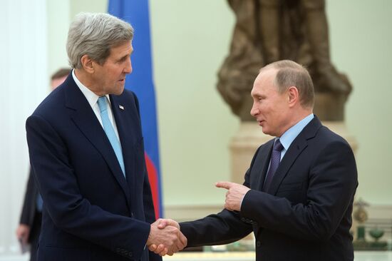 President Vladimir Putin meets with US Secretary of State John Kerry