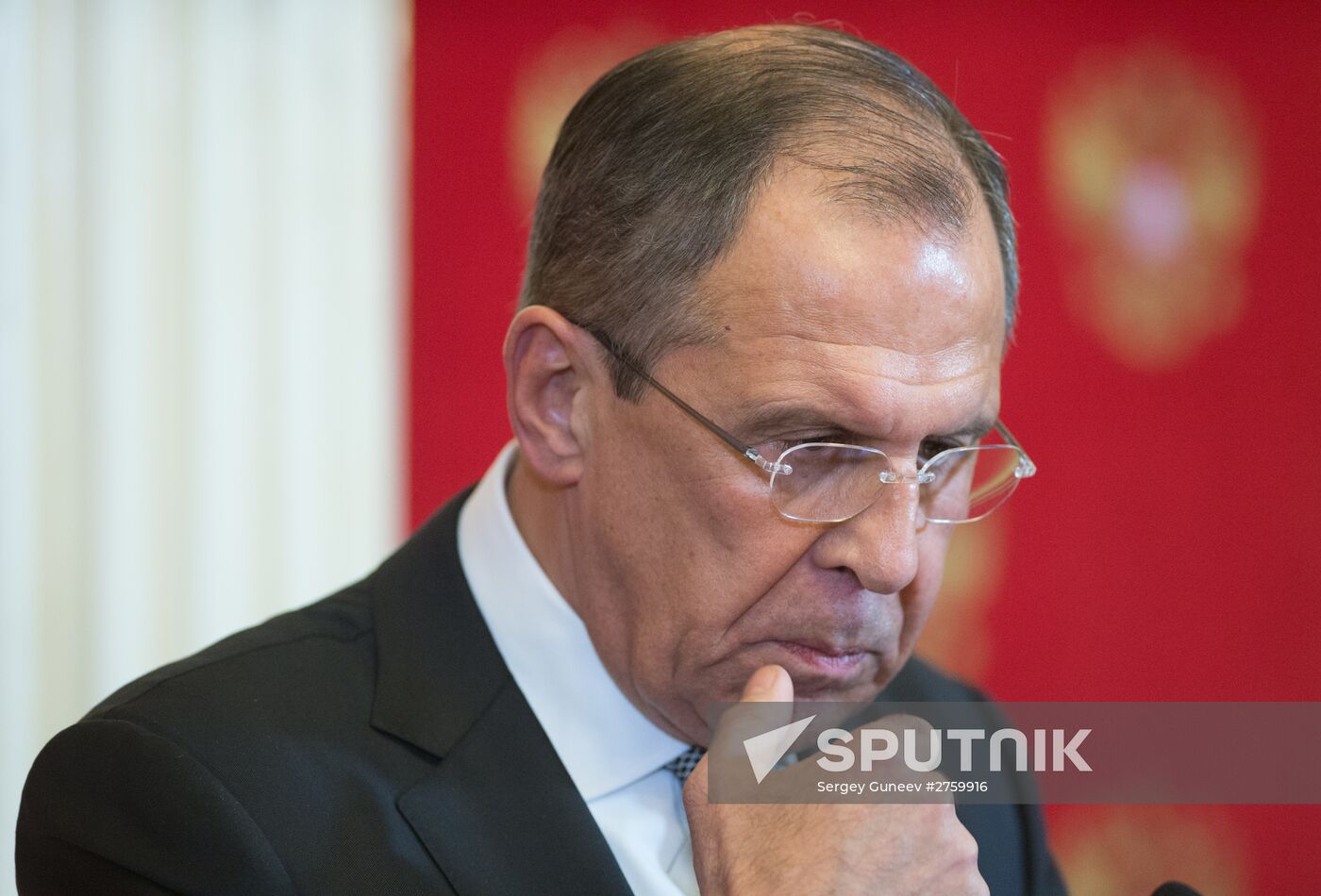 Russian President Vladimir Putin's meeting with U.S. Secretary of State John Kerry