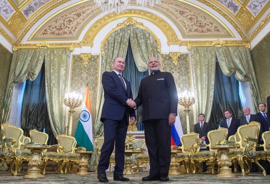 Russian President Vladimir Putin meets with Indian Prime Minister Narendra Modi