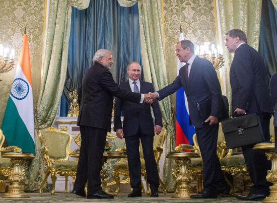 Russian President Vladimir Putin meets with Indian Prime Minister Narendra Modi