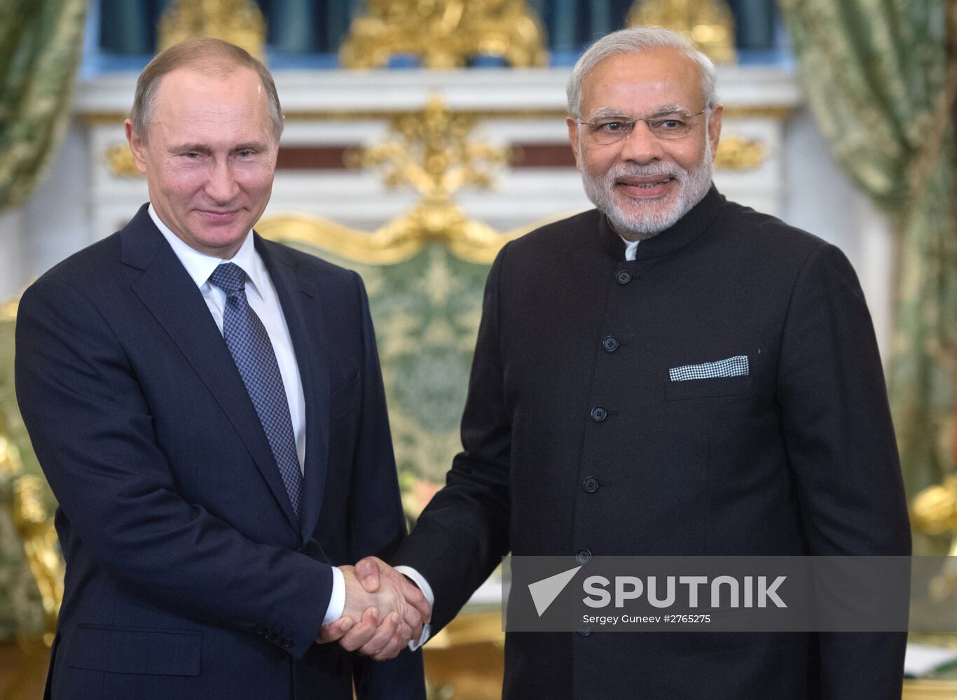 Russian President Vladimir Putin meets with Indian Prime Minister Narendra Modi