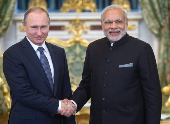 Russian President Vladimir Putin meets with Indian Prime Minister Narendra Modi