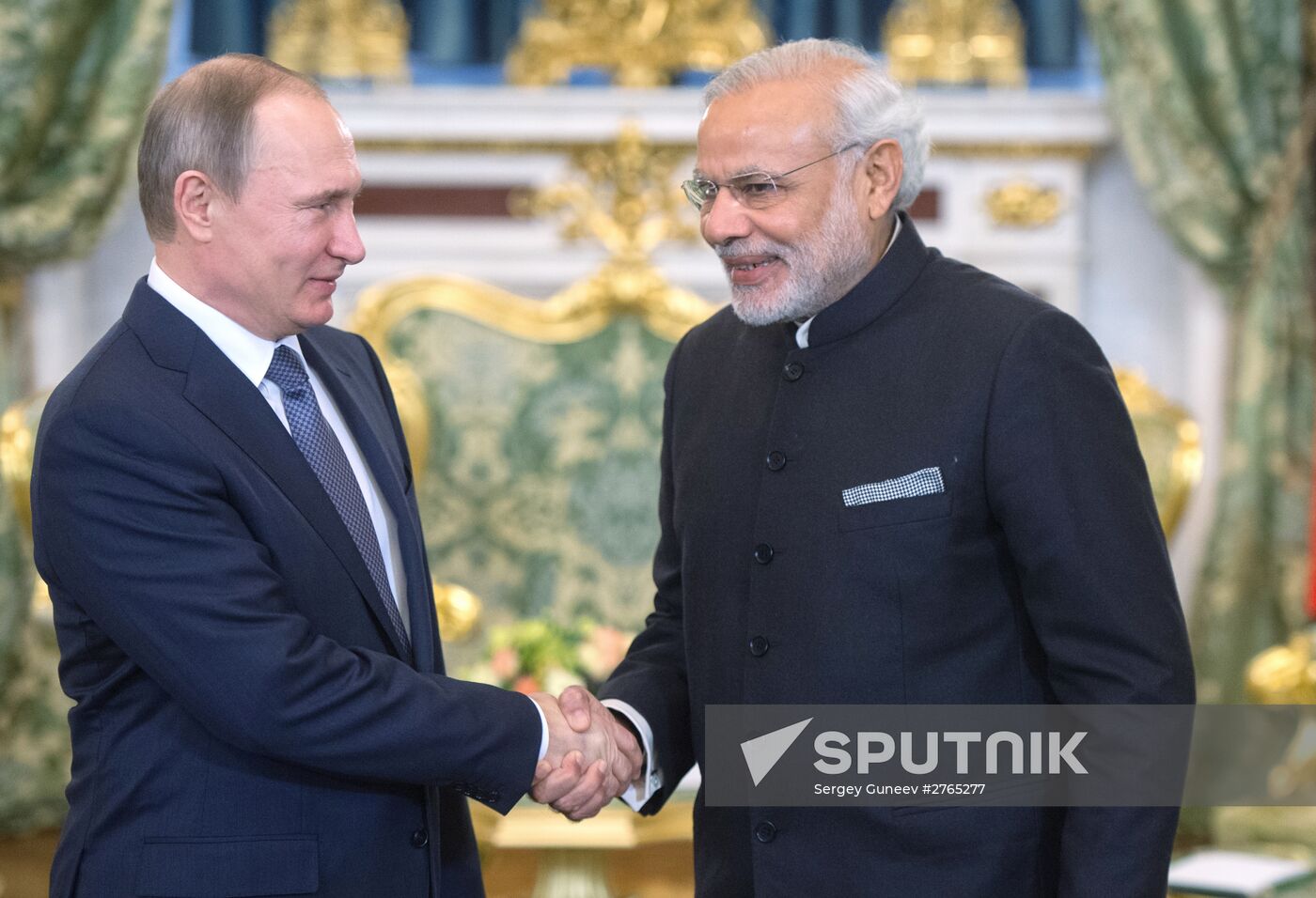 Russian President Vladimir Putin meets with Indian Prime Minister Narendra Modi