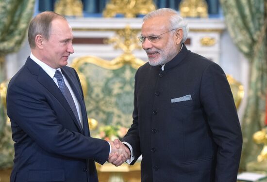 Russian President Vladimir Putin meets with Indian Prime Minister Narendra Modi