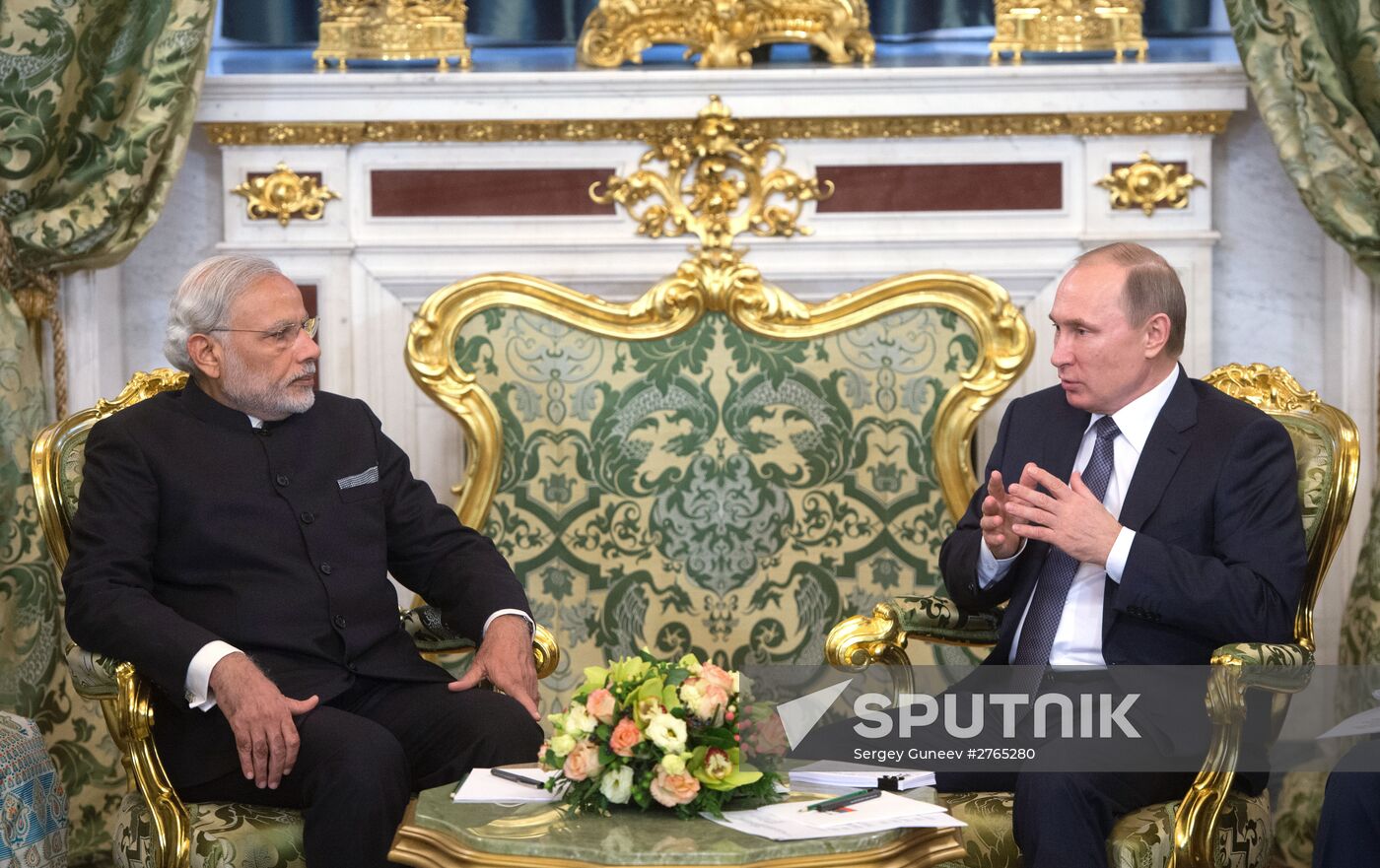 Russian President Vladimir Putin meets with Indian Prime Minister Narendra Modi