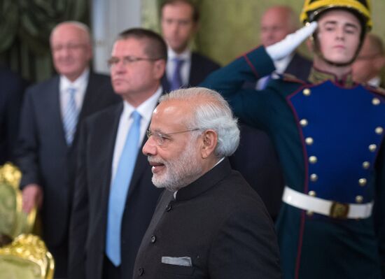 Russian President Vladimir Putin meets with Indian Prime Minister Narendra Modi