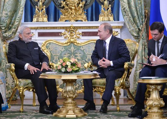 Russian President Vladimir Putin meets with Indian Prime Minister Narendra Modi