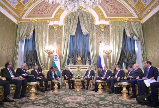 Russian President Vladimir Putin meets with Indian Prime Minister Narendra Modi
