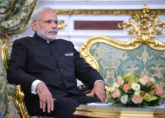 Russian President Vladimir Putin meets with Indian Prime Minister Narendra Modi