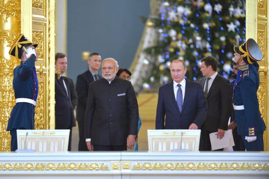 Russian President Vladimir Putin meets with Indian Prime Minister Narendra Modi