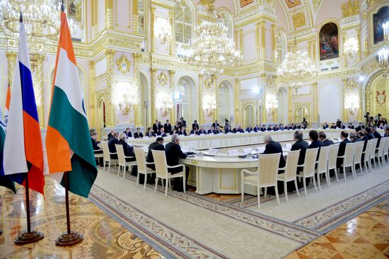 Russian President Vladimir Putin meets with Indian Prime Minister Narendra Modi