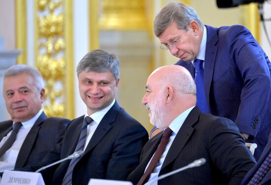 Russian President Vladimir Putin meets with Indian Prime Minister Narendra Modi