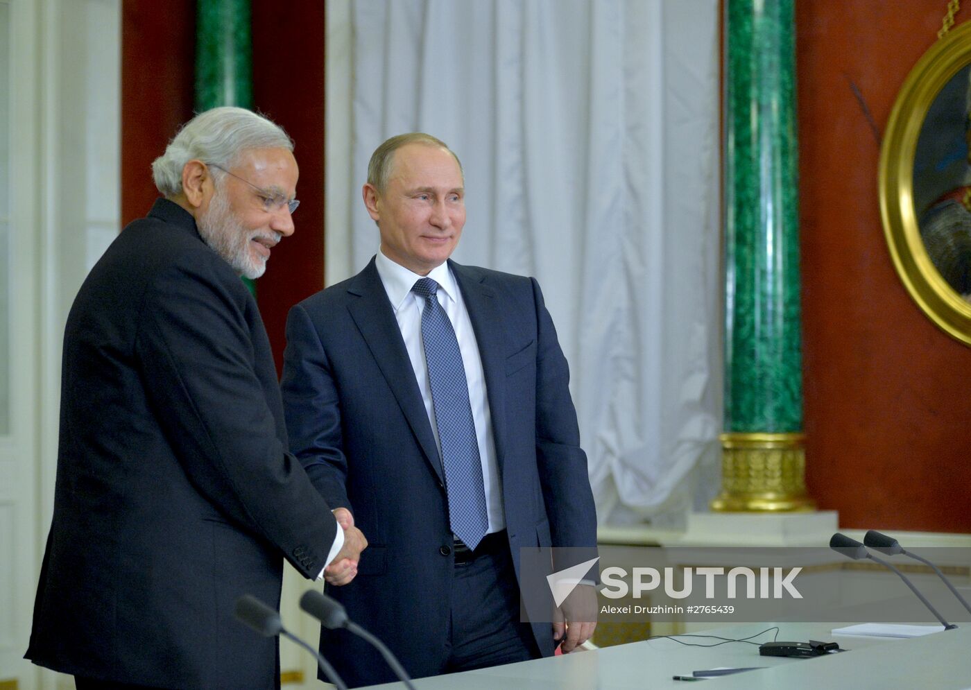 Russian President Vladimir Putin meets with Indian Prime Minister Narendra Modi