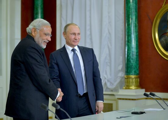 Russian President Vladimir Putin meets with Indian Prime Minister Narendra Modi