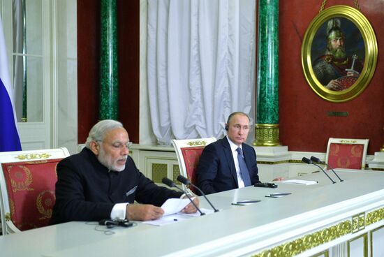 Russian President Vladimir Putin meets with Indian Prime Minister Narendra Modi