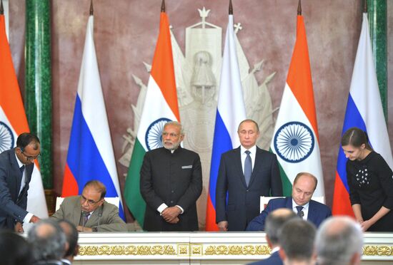 Russian President Vladimir Putin meets with Indian Prime Minister Narendra Modi
