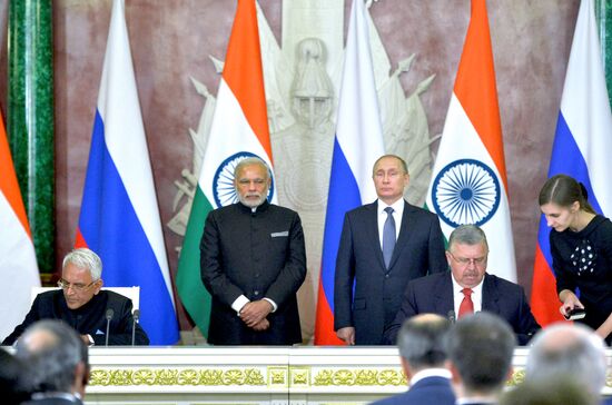 Russian President Vladimir Putin meets with Indian Prime Minister Narendra Modi