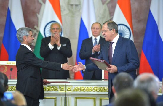 Russian President Vladimir Putin meets with Indian Prime Minister Narendra Modi