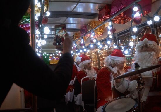 Busload of Fathers Frost in St.Petersburg