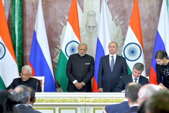 Russian President Vladimir Putin meets with Indian Prime Minister Narendra Modi