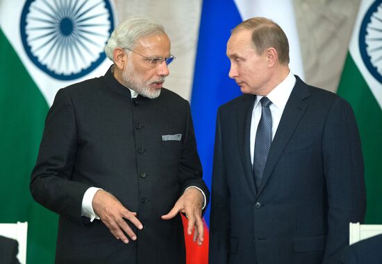 Russian President Vladimir Putin meets with Indian Prime Minister Narendra Modi