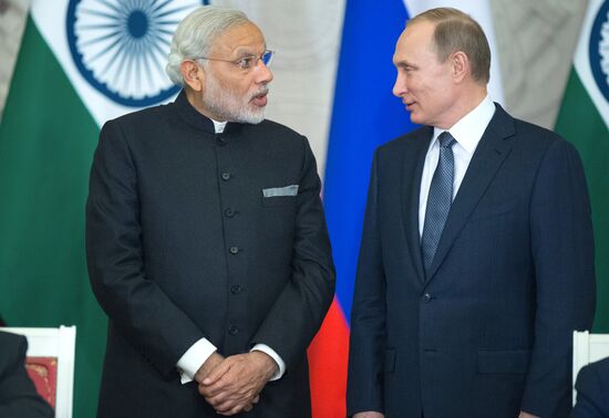 Russian President Vladimir Putin meets with Indian Prime Minister Narendra Modi
