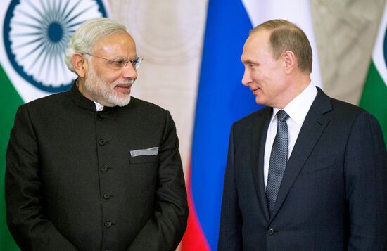 Russian President Vladimir Putin meets with Indian Prime Minister Narendra Modi