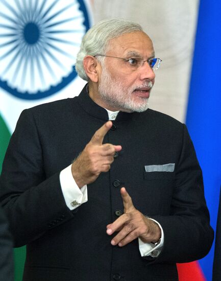 Russian President Vladimir Putin meets with Indian Prime Minister Narendra Modi