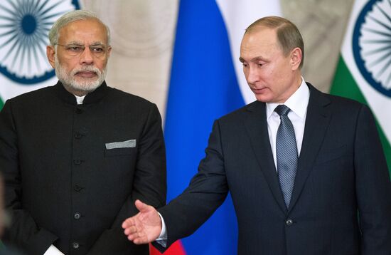 Russian President Vladimir Putin meets with Indian Prime Minister Narendra Modi