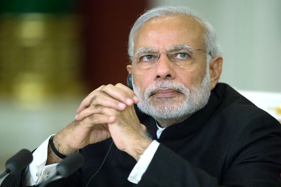 Russian President Vladimir Putin meets with Indian Prime Minister Narendra Modi