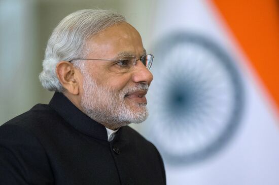 Russian President Vladimir Putin meets with Indian Prime Minister Narendra Modi