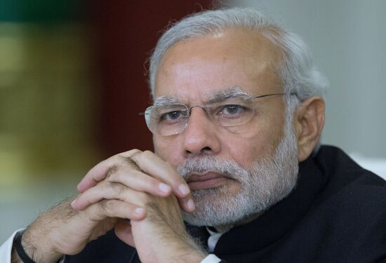 Russian President Vladimir Putin meets with Indian Prime Minister Narendra Modi