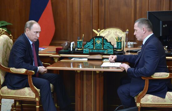 Russian President Vladimir Putin meets with Presidential Envoy to Far Eastern Federal District Yury Trutnev
